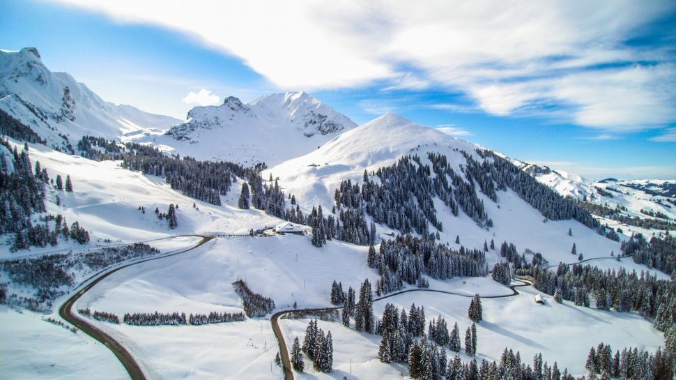 Free Image of Snow Covered Mountain With Road 