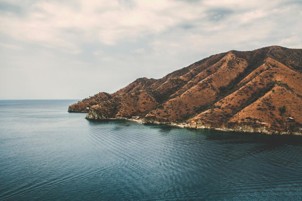 Free Image of Majestic Lake Surrounded by Towering Mountains 