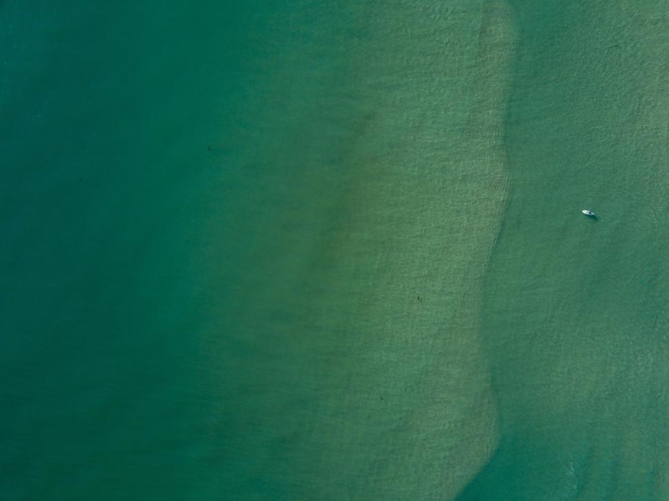 Free Image of Boat Sailing Across Water 