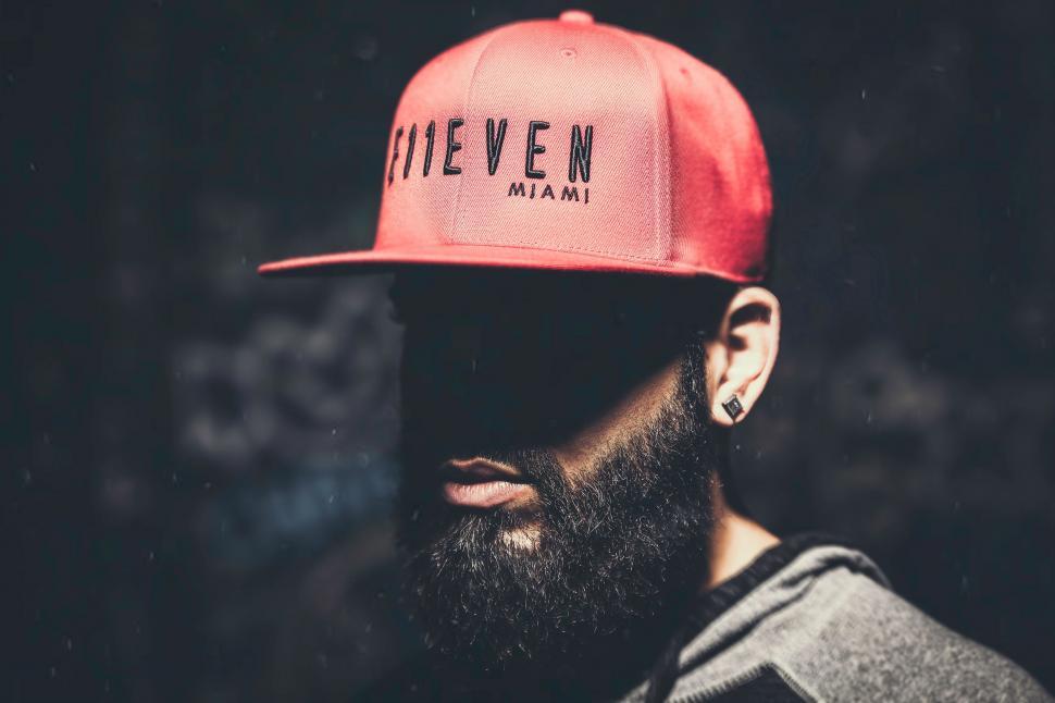 Free Image of Man With Beard Wearing Red Hat 