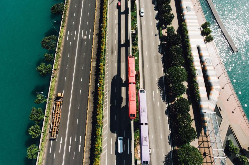 Free Image of Aerial View of Highway and Body of Water 
