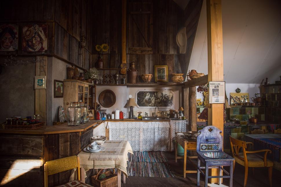 Free Image of A Room Filled With Lots of Wooden Furniture 