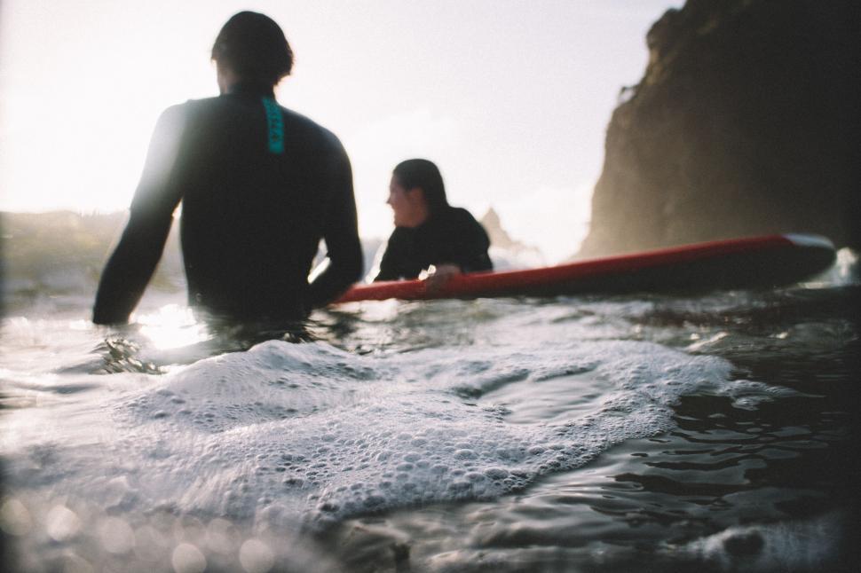 Free Image of Two People Swimming in the Water 
