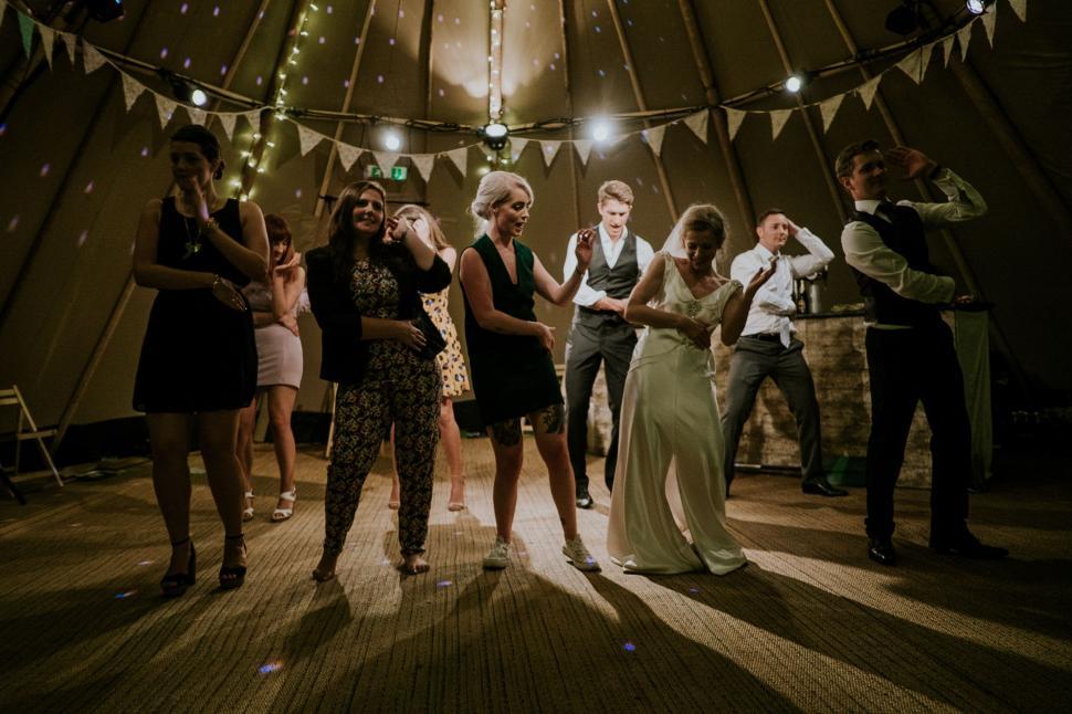 Free Image of Group of People Standing Around Each Other 