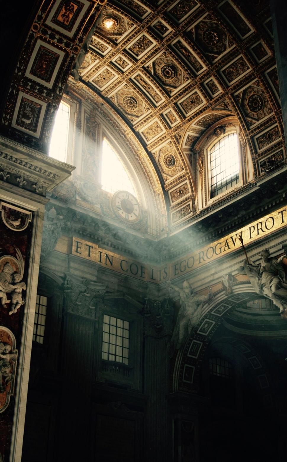 Free Image of Sunlight Shining Through a Window Into a Building 