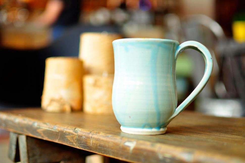 Free Image of Coffee Cup on Wooden Table 