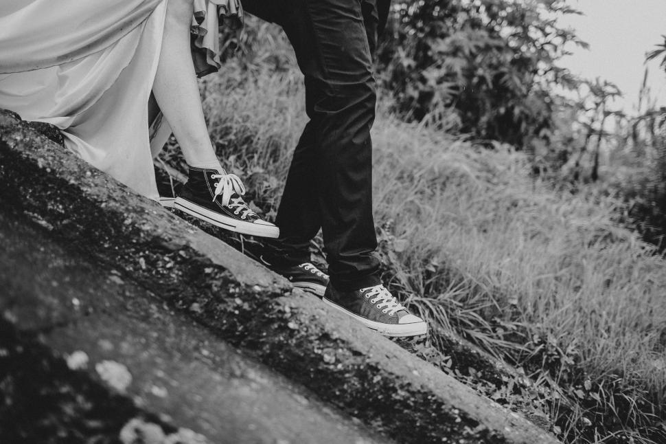 Free Image of Couple Holding Hands 