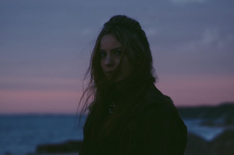 Free Image of Woman With Long Hair by Water 