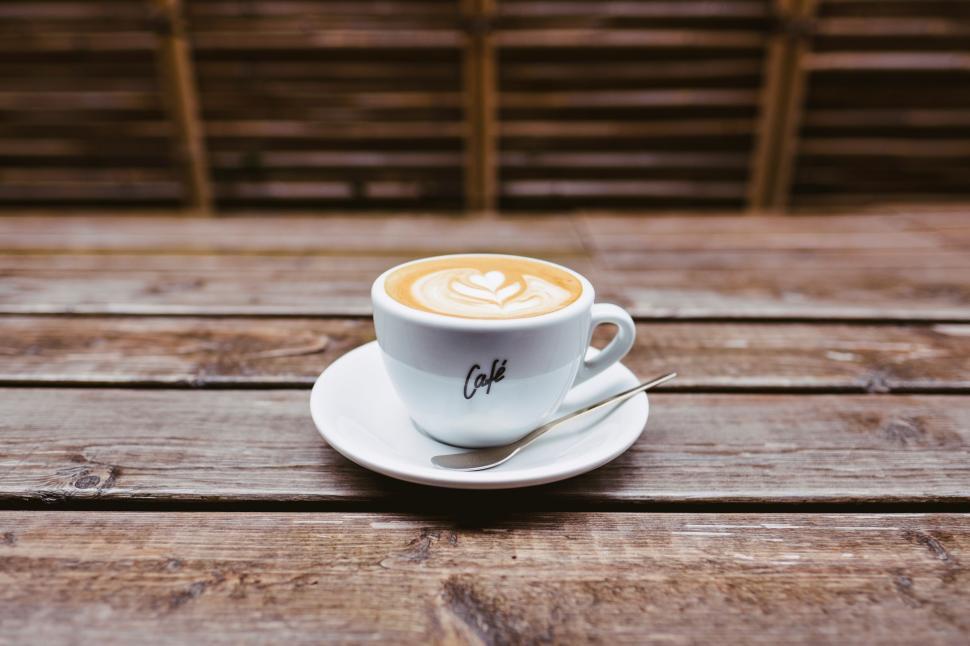 Free Image of A Cup of Coffee on a Wooden Table 