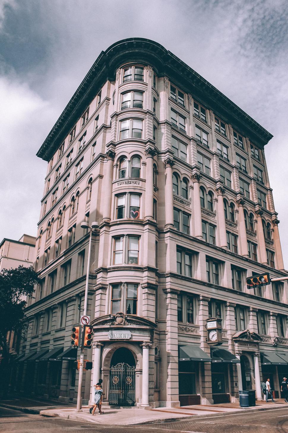 Free Image of Tall Building on Street Corner 