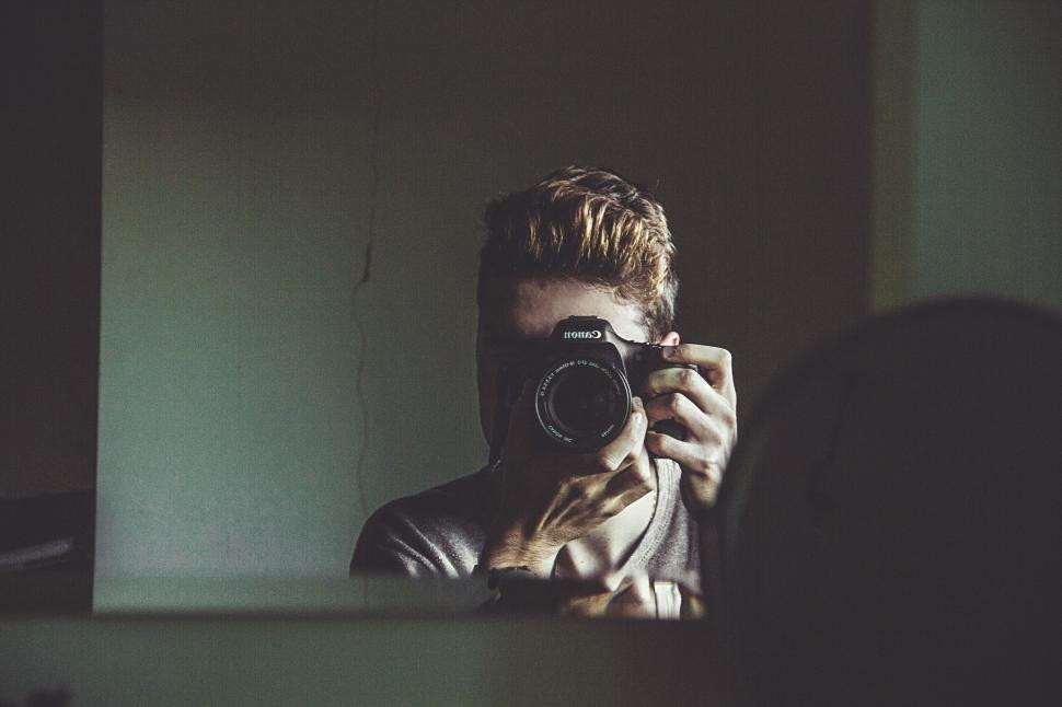 Free Image of Man Taking Selfie in Mirror 
