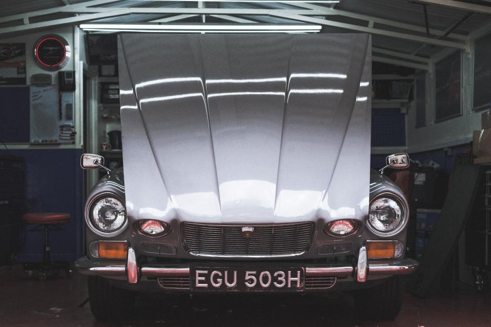 Free Image of Silver Truck Parked in Garage Under Roof 