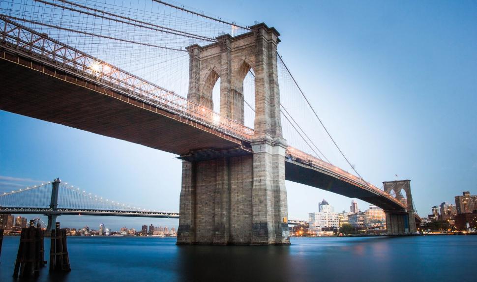 Free Image of Large Bridge Spanning Over a Large Body of Water 