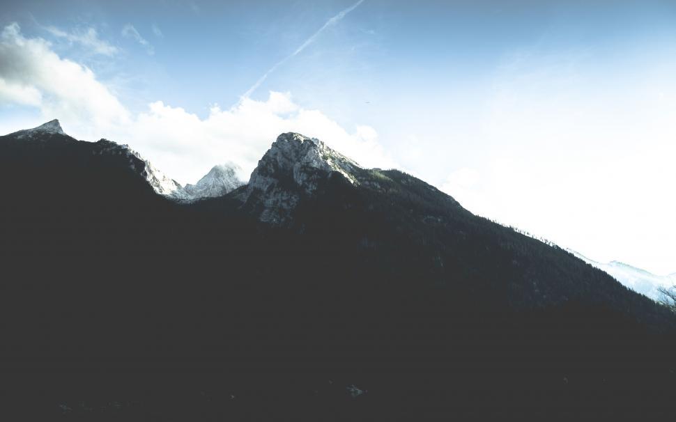 Free Image of Majestic Mountain Peak Amidst Clear Sky 