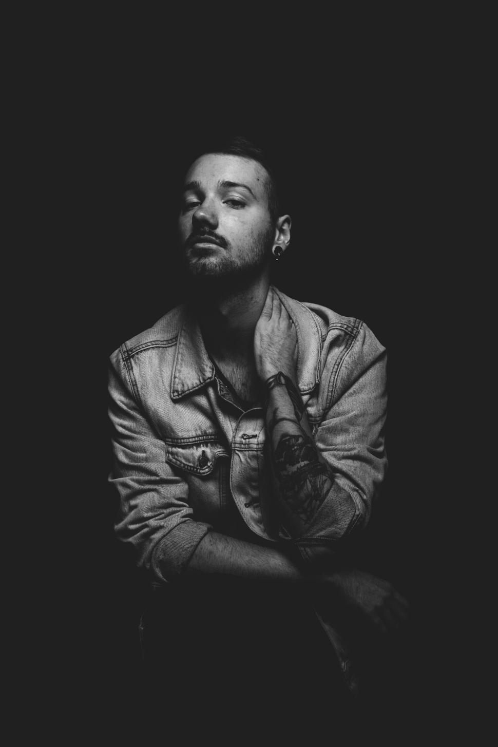 Free Image of Man Standing With Crossed Arms 