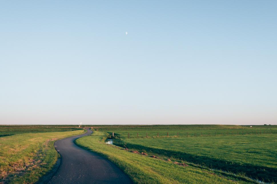 Free Image of Winding Road in Green Field 