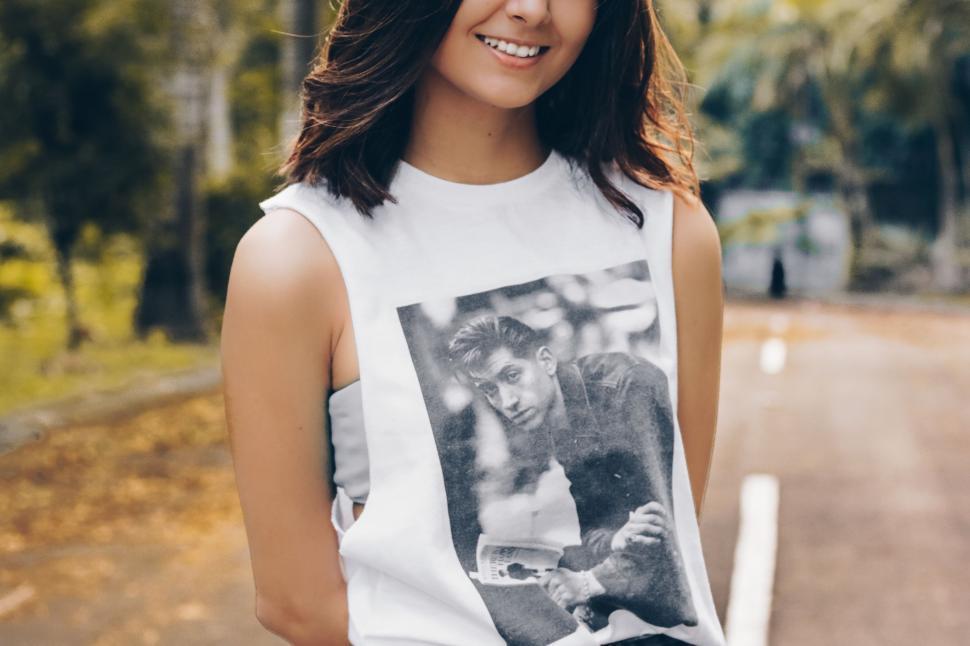 Free Image of Woman Standing on Side of Road 