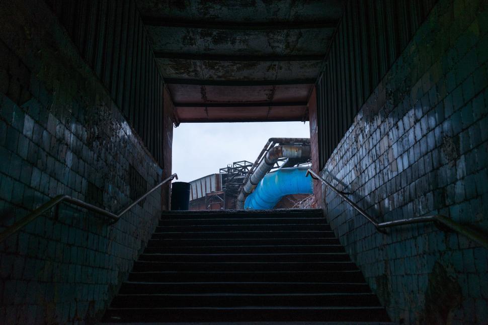Free Image of Stairs Ascending to Window 