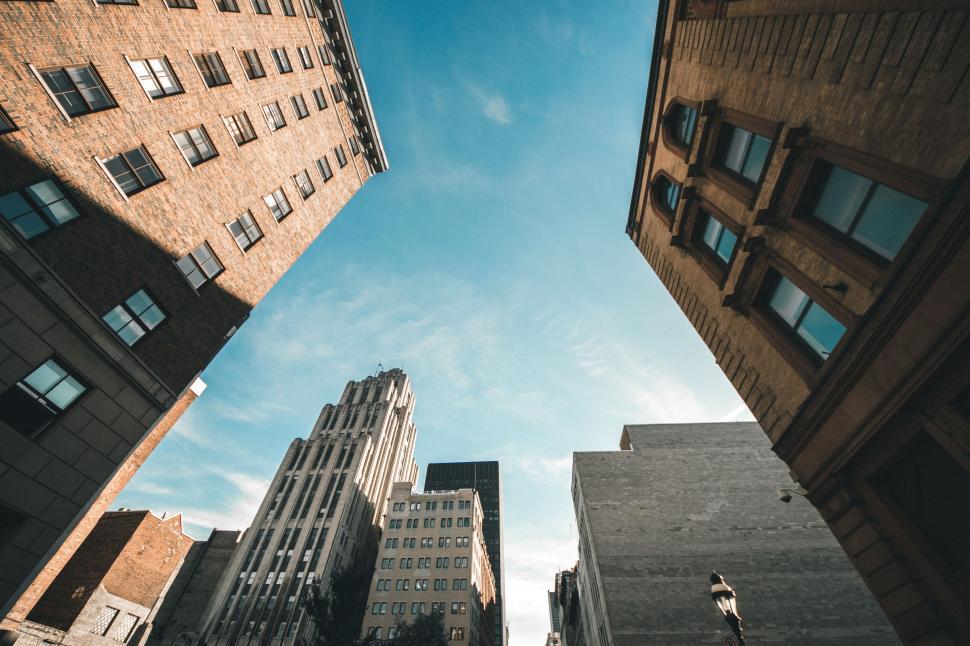 Free Image of Looking Up at Tall Buildings in a City 