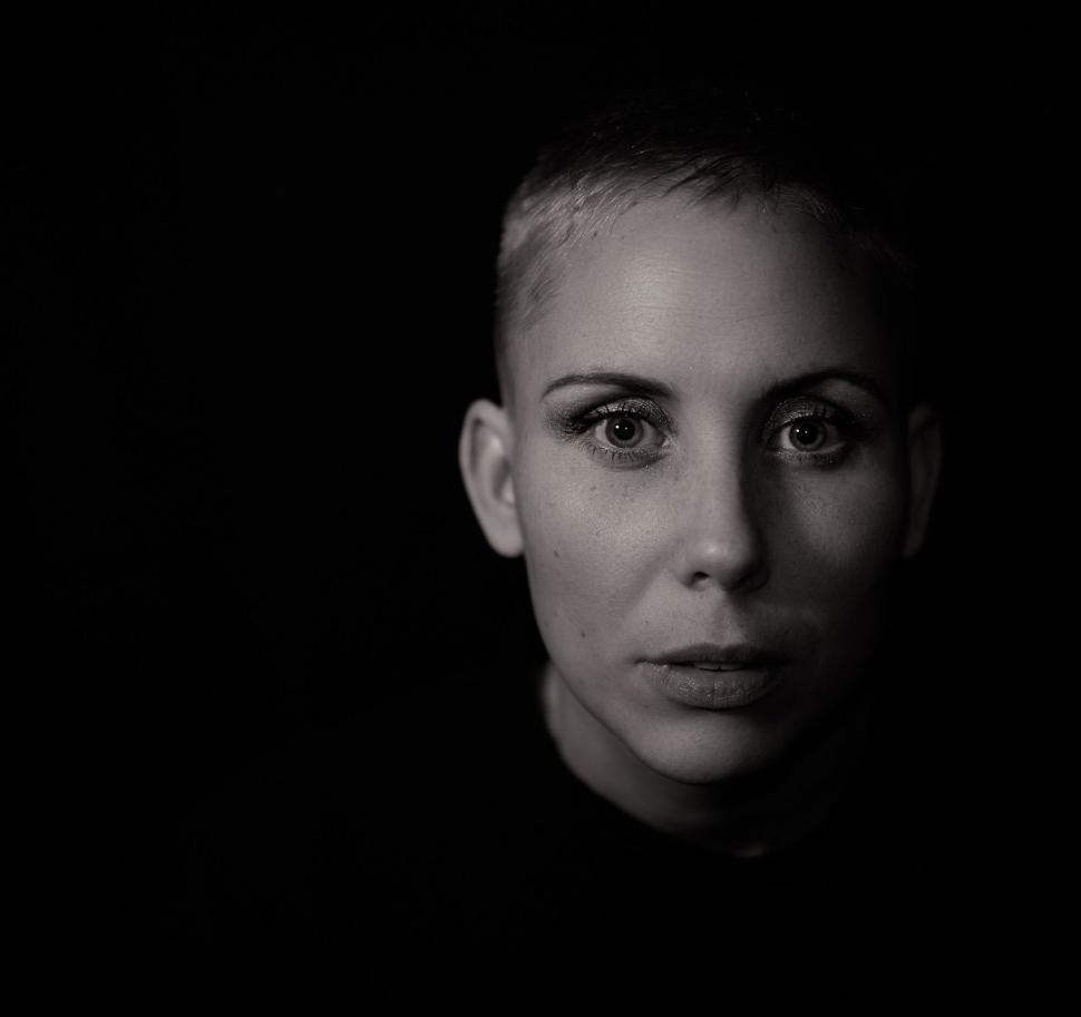 Free Image of Close-Up Portrait of a Womans Face in Black and White 