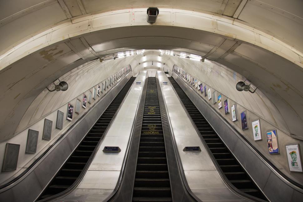 Free Image of Signs on Escalator in Subway Station 