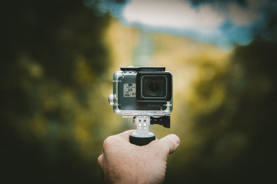 Free Image of Person Holding Camera in Hand 