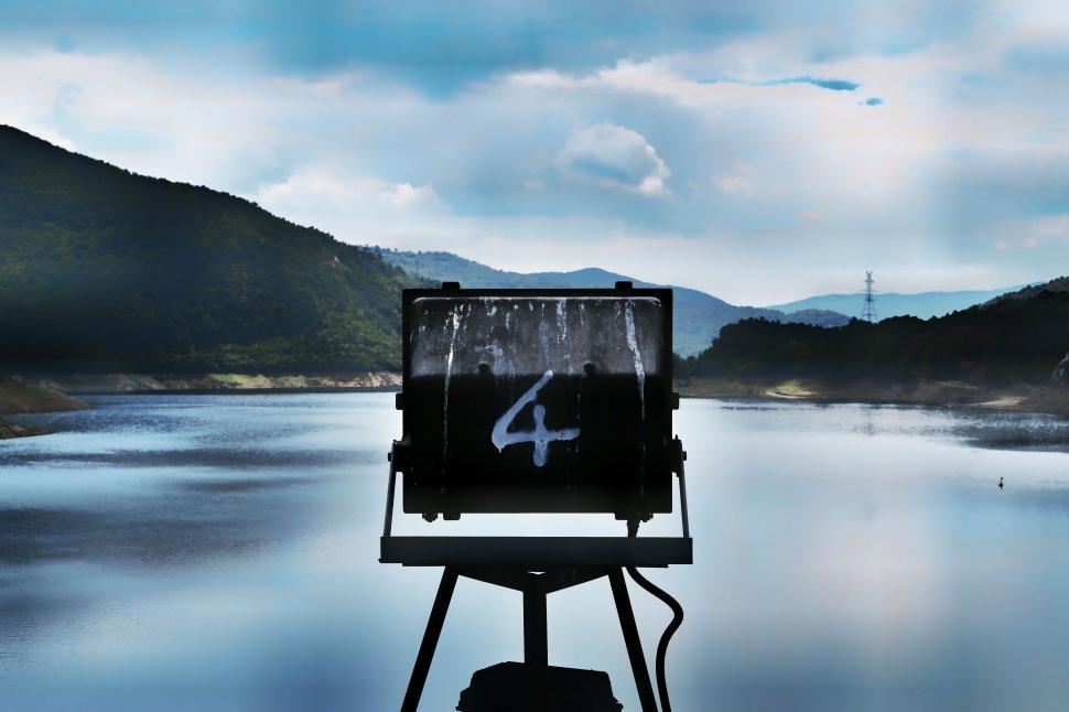 Free Image of Camera on Tripod by Lake 
