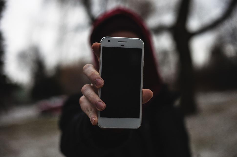 Free Image of Person Holding Cell Phone 