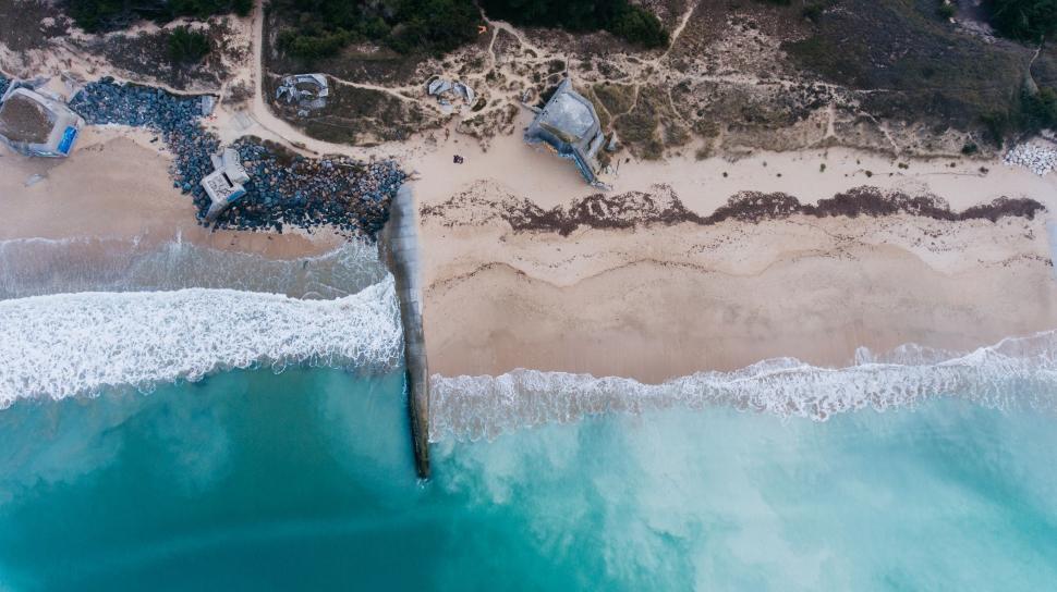 Free Image of Aerial View of Sandy Beach and Ocean 