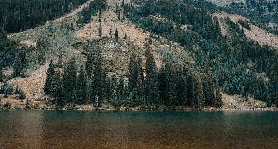 Free Image of Snow-Covered Mountain by Water 