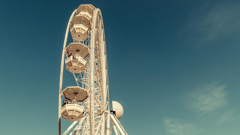 Free Image of Ferris Wheel Against Blue Sky 