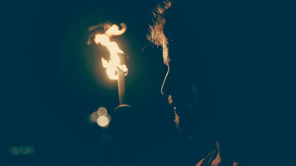 Free Image of Man Checking Cell Phone at Night 