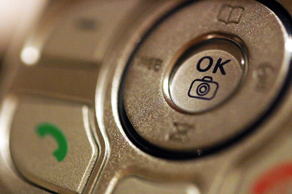 Free Image of Close Up of Button on Cell Phone 