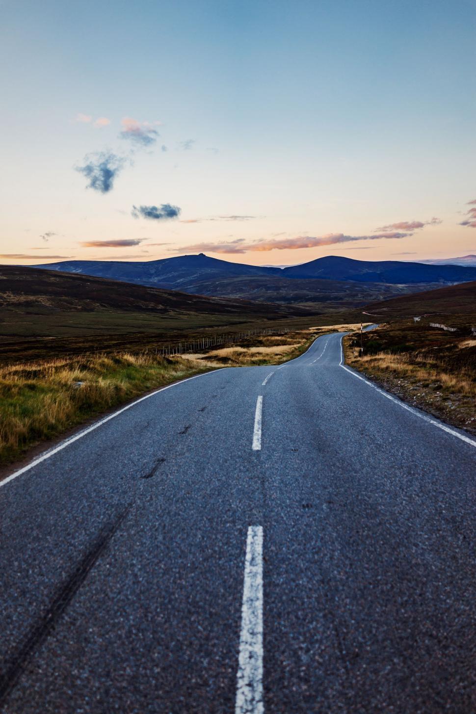 Free Image of Desolate Road Stretching Through Remote Landscape 