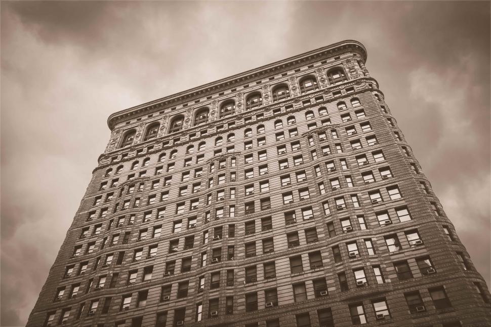 Free Image of Towering Skyscraper With Multiple Windows 