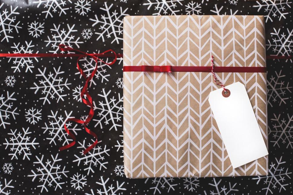 Free Image of Gift Wrapped in Brown Paper With Red Ribbon 