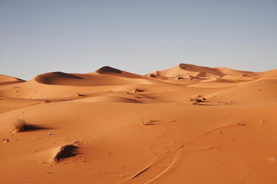 Free Image of A Group of Sand Dunes in the Desert 