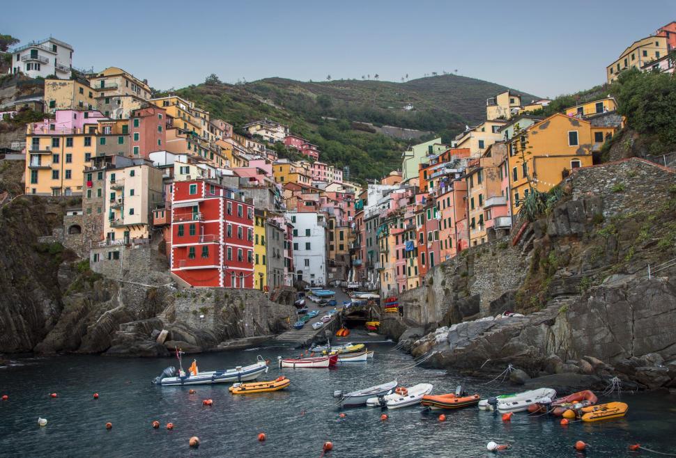 Free Image of Group of Boats Floating on Body of Water 
