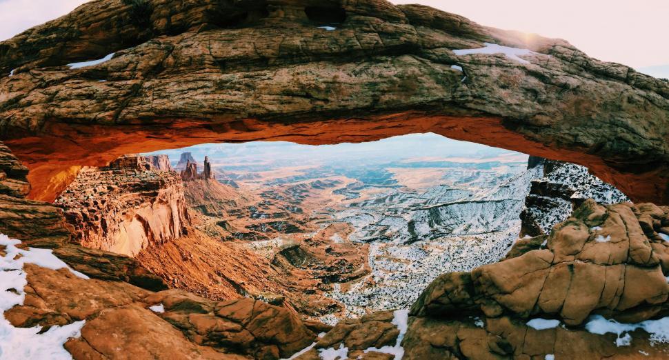 Free Image of Majestic Rock Formation Covered in Snow 