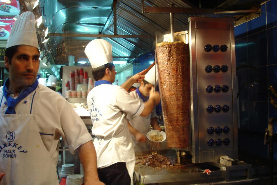 Free Image of Chefs Preparing Food in Busy Restaurant Kitchen 