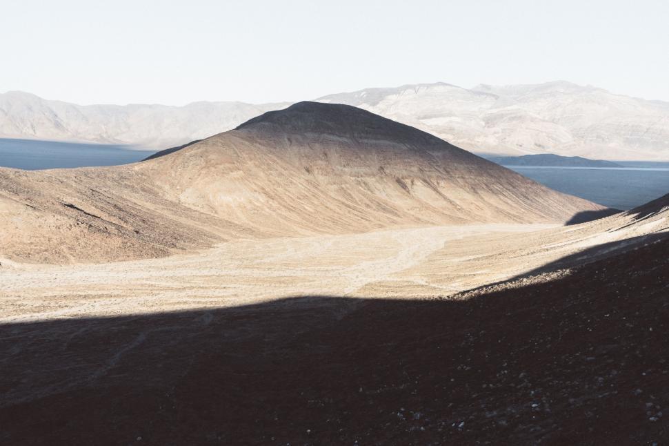 Free Image of A View of a Mountain Range From a Distance 