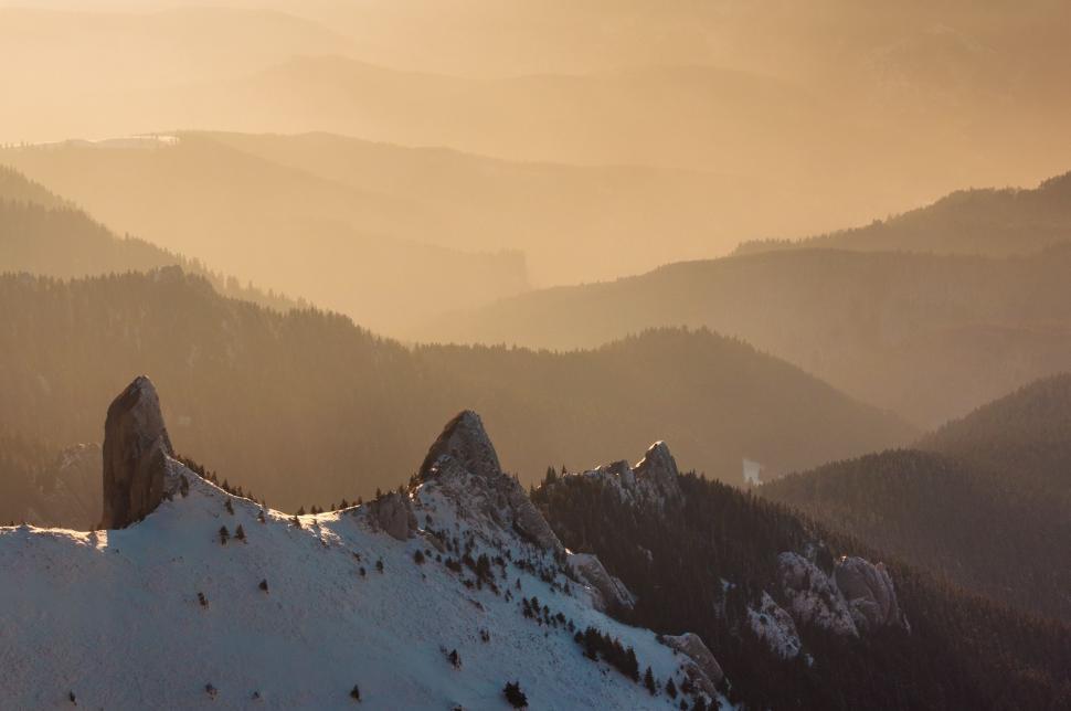 Free Image of Snow-Covered Mountain Range Under Clear Sky 