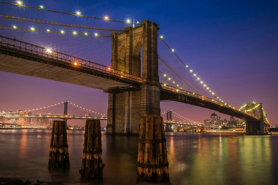 Free Image of Massive Bridge Spanning Over Vast Water Body 