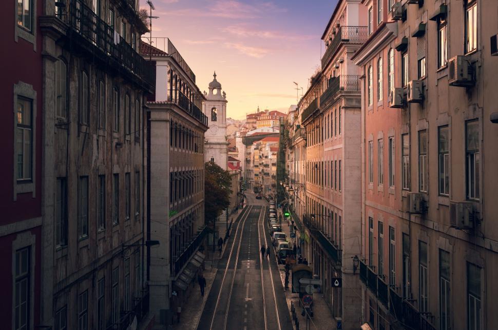 Free Image of Bustling City Street With Tall Buildings and Traffic 