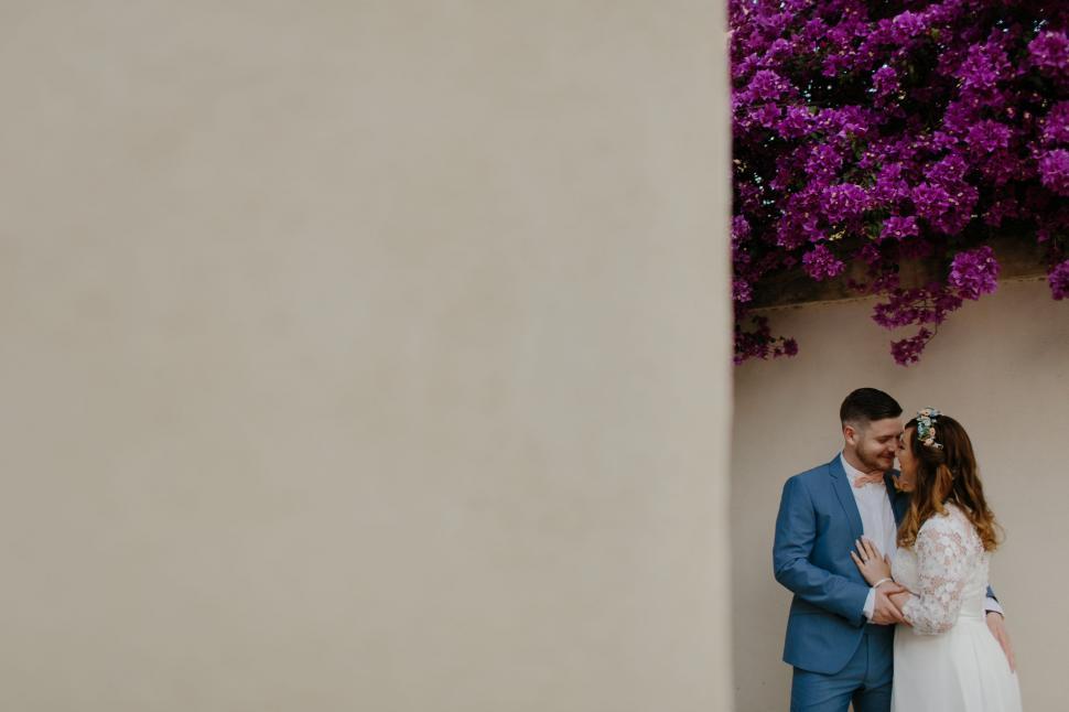 Free Image of A Man and a Woman Standing Next to Each Other 