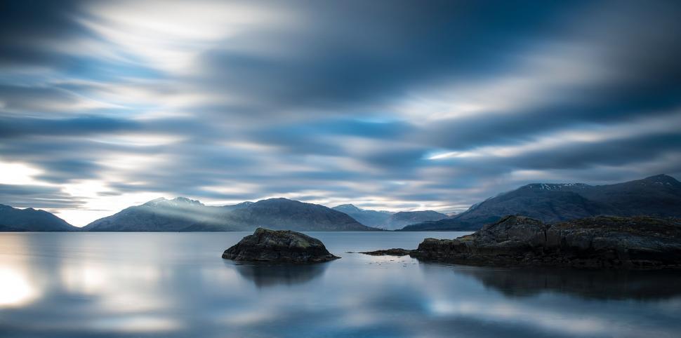 Free Image of Mountainous Landscape With Water Body and Cloudy Sky 