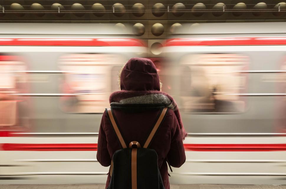 Free Image of Person With Backpack Waiting for Train 