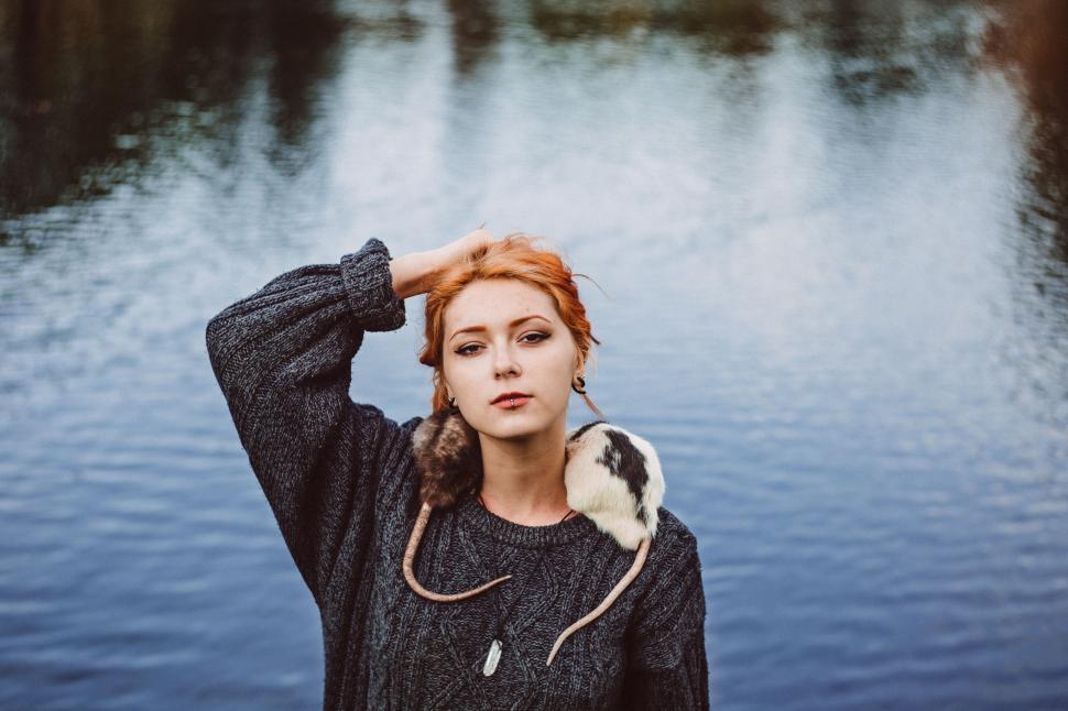 Free Image of Woman Standing by Water 