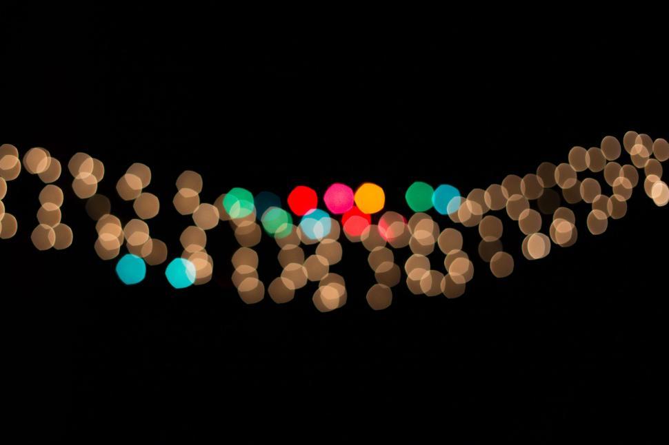 Free Image of Blurry String of Lights 