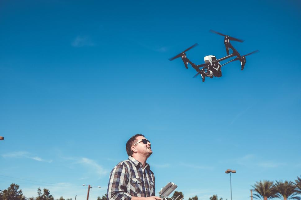Free Image of Man Observing a Flying Object 